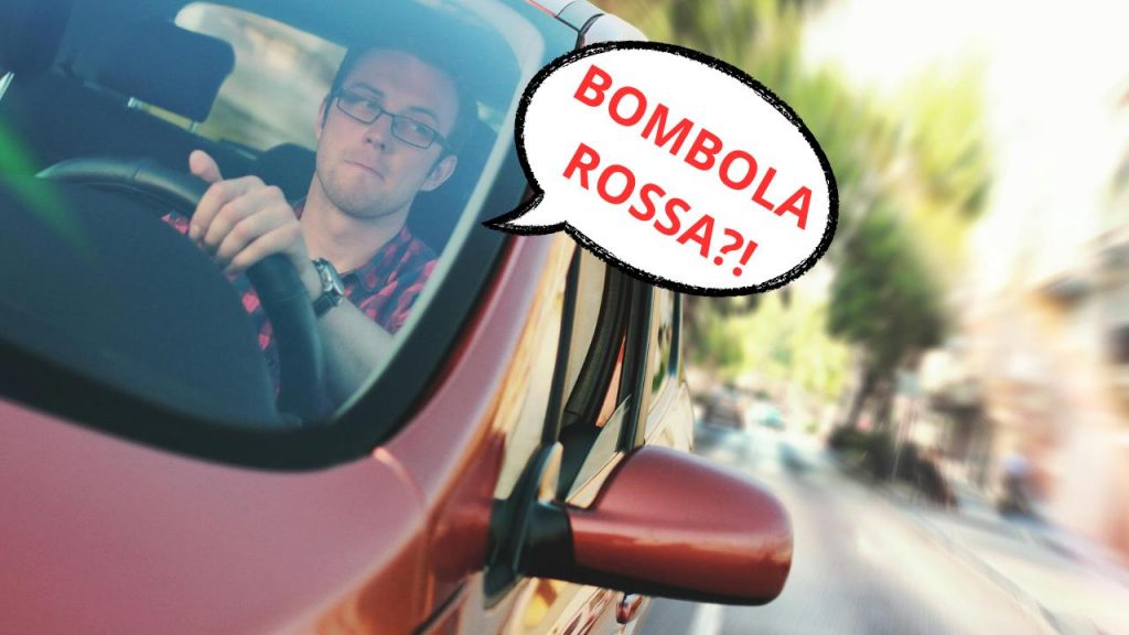 Uomo in auto con espressione dubbiosa